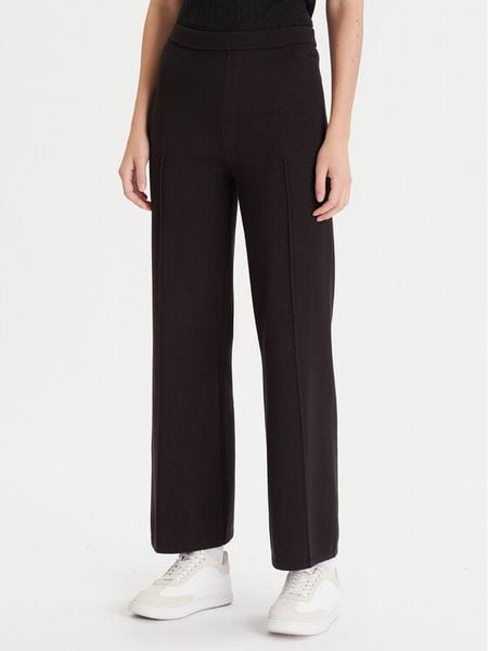 Calvin Klein Spodnie dzianinowe LV044D368G Czarny Wide Leg. Czarne spodnie materiałowe damskie Calvin Klein, bez wzorów, z dzianiny. Za 379.99 zł.