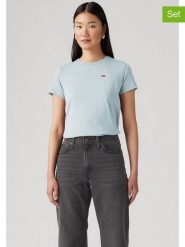 Levi's Koszulka w kolorze błękitnym rozmiar: M. Niebieskie bluzki damskie Levi's, m, bez wzorów, z bawełny, bez kołnierzyka, bez ramiączek. Za 118.84 zł.