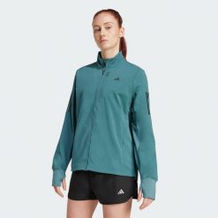 Kurtka do biegania Own the Run Winterized. Niebieskie kurtki damskie Adidas, m, bez wzorów, bez kaptura. Za 439.00 zł.