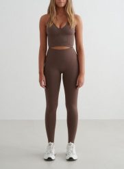Damskie legginsy bezszwowe, wysoki stan, squat proof petite Shape brąz macchiato. Brązowe legginsy damskie Aim'n, xl, bez wzorów, z elastanu. Za 296.00 zł.
