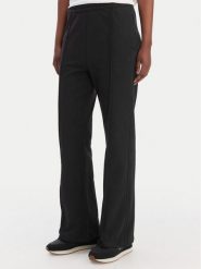Calvin Klein Jeans Spodnie dresowe Archive Logo LV047B240G Czarny Regular Fit. Czarne spodnie dresowe damskie Calvin Klein Jeans, l, bez wzorów, z bawełny. Za 369.99 zł.