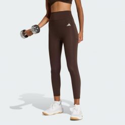 Legginsy Optimé Essentials No Front Rise Seam 7/8. Brązowe legginsy damskie Adidas, xs, bez wzorów, z elastanu. Za 219.00 zł.