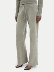 Juicy Couture Spodnie dresowe JCWEB006 Khaki Regular Fit. Brązowe spodnie dresowe damskie Juicy Couture, xl, bez wzorów, z dresówki. Za 549.99 zł.