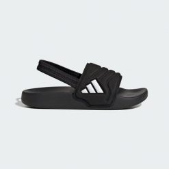 Klapki Adilette Estrap 2.0 Slides Children. Białe klapki damskie Adidas, bez wzorów, bez obcasa, bez zapięcia. Za 109.00 zł.