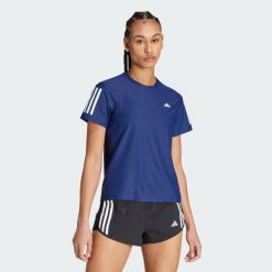 Koszulka Own The Run. Niebieskie koszulki damskie Adidas, xs, bez wzorów, z materiału, bez kołnierzyka, bez ramiączek. Za 159.00 zł.