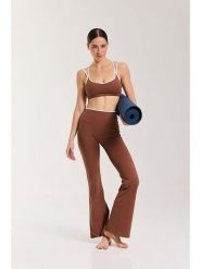 Onamaste Legginsy sportowe "Flair Yska" w kolorze jasnobrązowym rozmiar: S/M. Brązowe legginsy damskie Onamaste, m, bez wzorów, z materiału. Za 130.99 zł.