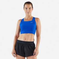 Koszulka do biegania bez rękawów damska Kiprun 900 Light crop top. Niebieskie koszulki damskie KIPRUN, m, bez wzorów, z elastanu, bez kołnierzyka, bez ramiączek. Za 129.99 zł.