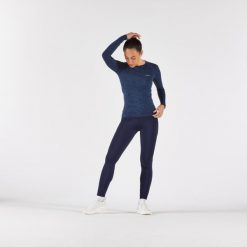 Legginsy do biegania damskie Kiprun Run 500 Warm ocieplane. Niebieskie legginsy damskie KIPRUN, l, bez wzorów, z elastanu. Za 139.99 zł.