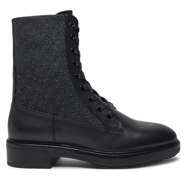 Trzewiki Calvin Klein. Czarne botki damskie Calvin Klein, bez obcasa, na płaskiej podeszwie, bez zapięcia. Za 549.99 zł.