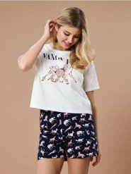 Bawełniana piżama dwuczęściowa z motywem psów - kremowy. Białe piżamy damskie Sinsay, bez wzorów, z bawełny, bez ramiączek. Za 39.99 zł.