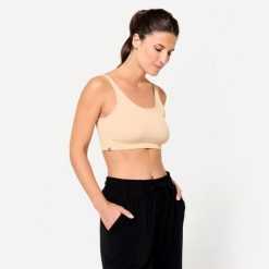 Stanik sportowy Kimjaly. Brązowe biustonosze sportowe damskie DOMYOS, bez wzorów, z elastanu. W wyprzedaży za 49.99 zł.
