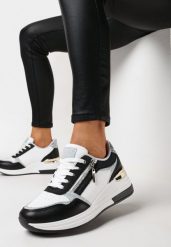 Czarno-Białe Sneakersy na Niskim Koturnie z Ozdobnym Suwakiem i Metaliczną Wstawką Lorealissa. Czarne obuwie sportowe damskie Born2be, bez zapięcia. Za 99.99 zł.