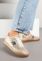 Złote Wężowe Sneakersy Tenisówki w Kultowym Stylu Neolithaen. Żółte obuwie sportowe damskie Renee, z jeansu, bez zapięcia, tenisowe. Za 74.99 zł.