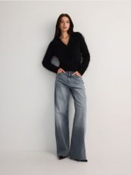 Jeansy wide leg z przetarciami - niebieski. Niebieskie jeansy damskie Reserved. W wyprzedaży za 89.99 zł.