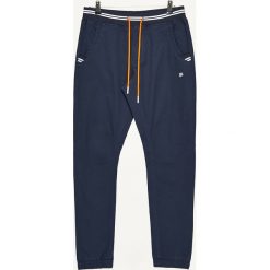 Materiałowe joggery - Granatowy. Spodnie materiałowe chłopięce marki 4F. Za 119.99 zł.