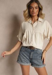 Jasnobeżowa Koszula z Wiskozą Ozdobiona Falbankami Oleldi. Brązowe koszule damskie Renee, bez wzorów, z jeansu, eleganckie, bez kołnierzyka, bez ramiączek. Za 54.99 zł.