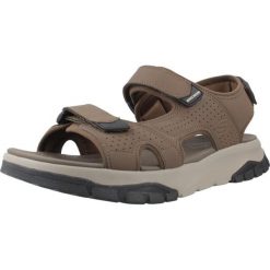 Sandały SKECHERS WAGNER AVALON Brązowy. Brązowe sandały damskie Skechers, bez wzorów, z materiału, bez obcasa, bez zapięcia. Za 233.99 zł.