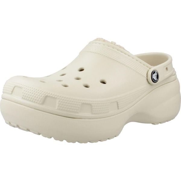 Klapki Crocs Model Lined Clog Kolor Beżowy. Białe klapki damskie Crocs, bez wzorów, z gumy, bez obcasa, bez zapięcia. Za 301.15 zł.