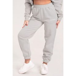 Spodnie fitness damskie Gym Glamour dresowe. Szare spodnie dresowe damskie GYM GLAMOUR, xs, bez wzorów, z dresówki. Za 189.99 zł.