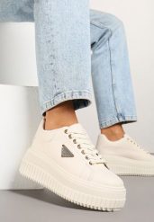 Beżowe Sneakersy na Tłoczonej Platformie Zdobione Metaliczną Aplikacją Fidania. Brązowe obuwie sportowe damskie Renee, z jeansu, bez zapięcia. Za 79.99 zł.