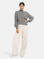 Milano Italy Bluzka w kolorze biało-czarnym rozmiar: 40. Białe bluzki damskie Milano Italy, bez wzorów, z wiskozy, bez kołnierzyka, bez ramiączek. Za 173.99 zł.