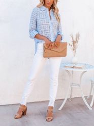 Milan Kiss Bluzka w kolorze błękitnym rozmiar: L. Niebieskie bluzki damskie Milan Kiss, l, bez wzorów, bez kołnierzyka, bez ramiączek. Za 165.99 zł.