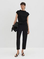 Someday Koszulka "Keala" w kolorze czarnym rozmiar: 36. Czarne bluzki damskie someday., bez wzorów, bez kołnierzyka, bez ramiączek. Za 95.99 zł.