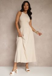 Jasnobeżowa Rozkloszowana Sukienka z Bawełny z Kieszeniami Lirevane. Brązowe sukienki damskie Renee, bez wzorów, z bawełny, eleganckie, bez ramiączek. W wyprzedaży za 111.99 zł.