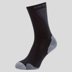 Skarpety Active Warm ODLO. Czarne skarpetki damskie ODLO, bez wzorów, z materiału. Za 99.65 zł.