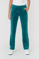 JUICY COUTURE Turkusowe spodnie Tina. Niebieskie spodnie dresowe damskie Juicy Couture, s, bez wzorów, z dresówki. W wyprzedaży za 299.99 zł.