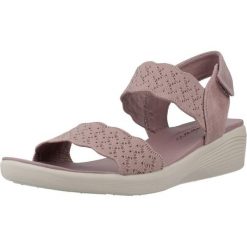 Sandały SKECHERS ARYA Fioletowy. Fioletowe sandały damskie Skechers, bez wzorów, z materiału, bez obcasa, bez zapięcia. Za 206.99 zł.