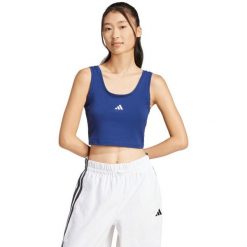 Koszulka damska adidas Essentials Small Logo Cotton Lifestyle Tank. Niebieskie bluzki damskie Adidas, bez wzorów, z bawełny, bez kołnierzyka, bez ramiączek. Za 77.99 zł.