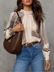 Milan Kiss Bluzka w kolorze kremowo-brązowym rozmiar: L. Brązowe bluzki damskie Milan Kiss, l, bez wzorów, bez kołnierzyka, bez ramiączek. Za 152.99 zł.