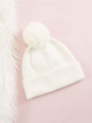 Czapka z pomponem - kremowy. Białe czapki damskie Sinsay, bez wzorów, z materiału. Za 29.99 zł.