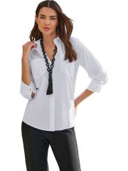 Heine Bluzka w kolorze białym rozmiar: 38. Białe bluzki damskie Heine, bez wzorów, bez kołnierzyka, bez ramiączek. Za 60.88 zł.