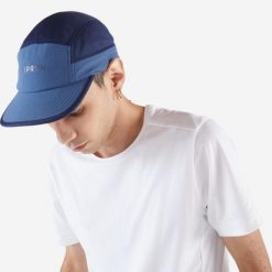 Czapka z daszkiem do biegania Kiprun 5 paneli. Niebieskie czapki z daszkiem damskie KIPRUN, bez wzorów, z materiału. Za 49.99 zł.