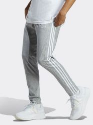 Adidas Spodnie dresowe w kolorze jasnoszarym rozmiar: 4XL. Szare spodnie dresowe damskie Adidas, xl, bez wzorów, z dresówki. Za 144.92 zł.