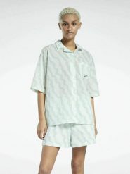 Reebok Koszula "Summer Waves" w kolorze zielonym rozmiar: S. Zielone koszule damskie Reebok, s, bez wzorów, bez kołnierzyka, bez ramiączek. Za 78.84 zł.