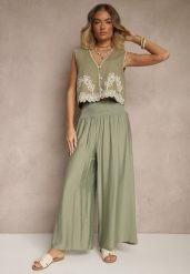 Jasnozielone Spodnie z Wiskozą o Szerokim Kroju High Waist Orrana. Zielone spodnie materiałowe damskie Renee, bez wzorów, z jeansu. Za 39.99 zł.