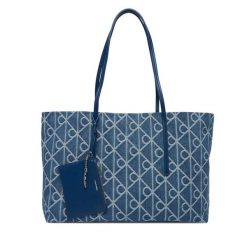 Torebka Calvin Klein. Niebieskie shopper bag Calvin Klein, bez wzorów, z denimu, bez dodatków. Za 649.99 zł.
