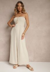 Beżowy Kombinezon Bandeau z Szeroką Nogawką Zdobiony Frędzlami Dovaira. Brązowe sukienki damskie Renee, z aplikacjami, boho, bez ramiączek. W wyprzedaży za 55.99 zł.