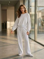 Spodnie dresowe wide leg - Inny. Spodnie sportowe damskie Sinsay, l, bez wzorów, z dresówki. Za 35.99 zł.