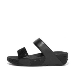 Kobiece klapki na koturnie FitFlop Lulu Hotfix. Czarne klapki damskie FIT FLOP, bez wzorów, bez obcasa, na koturnie, bez zapięcia. Za 374.85 zł.