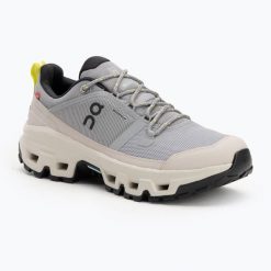 Buty damskie On Cloudrock Low Waterproof. Szare obuwie trekkingowe damskie On, z gumy, bez zapięcia. Za 863.25 zł.