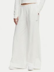 Tommy Jeans Spodnie dresowe Metallic Logo DW0DW22735 Biały Wide Leg. Białe spodnie dresowe damskie Tommy Jeans, xxs, bez wzorów, z bawełny. Za 409.99 zł.