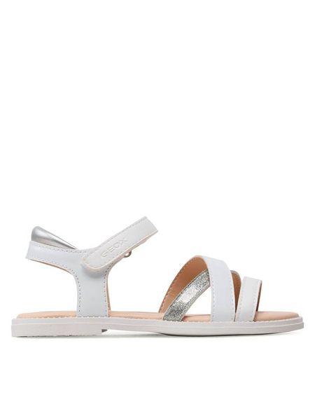 Geox Sandały J Sandal Karly Girl J5235D00254C1000 S Biały. Białe sandały dziewczęce Geox, ze skóry, bez obcasa, bez zapięcia. Za 249.99 zł.
