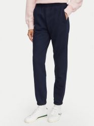 Lacoste Spodnie dresowe XF5268 Granatowy Regular Fit. Niebieskie spodnie dresowe damskie Lacoste, bez wzorów, z bawełny. Za 549.99 zł.