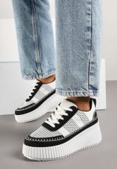 Czarno-Białe Sneakersy na Grubej Podeszwie z Tłoczeniami Zdobione Przeszyciami Falinia. Czarne obuwie sportowe damskie Born2be, z jeansu, bez zapięcia. Za 89.99 zł.