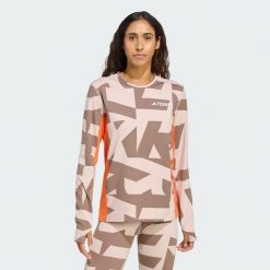 Koszulka z długim rękawem Multi Synthetic Base Layer. Brązowe koszulki damskie Adidas, uniwersalny, bez wzorów, bez kołnierzyka, bez ramiączek. Za 219.00 zł.