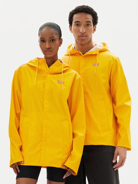Hunter Kurtka przeciwdeszczowa Izzy Unisex HARU0012251 Żółty Regular Fit. Żółte kurtki damskie Hunter, l, bez wzorów, z syntetyku, bez kaptura. Za 189.99 zł.